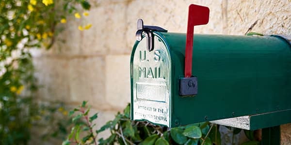 US post mail letter box with red flag